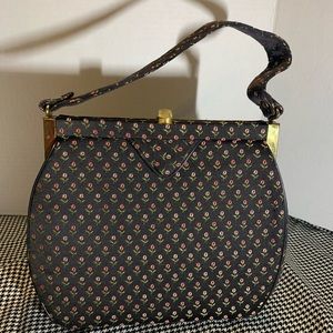 Vintage printed fabric, snap clasp.